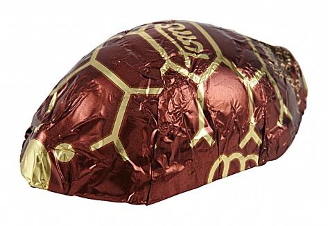 Toms Turtles hořká čokoláda plněná rumovým krémem a karamelem 28 g